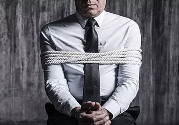 Kidnap, Ransom and Extortion Kidnapped man in ropes