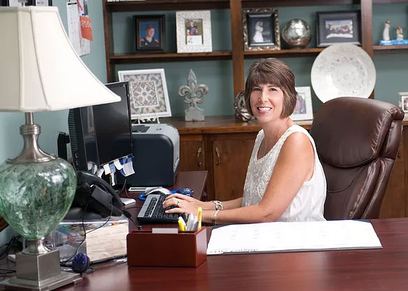 avery hall insurance payments woman at desk