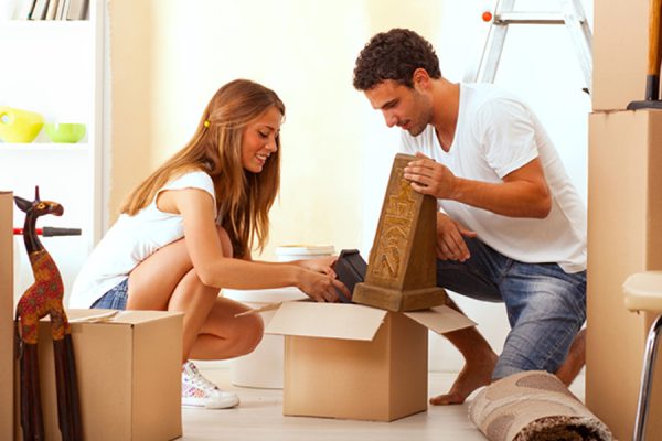 Man and Woman unpacking Man and Woman unpacking
